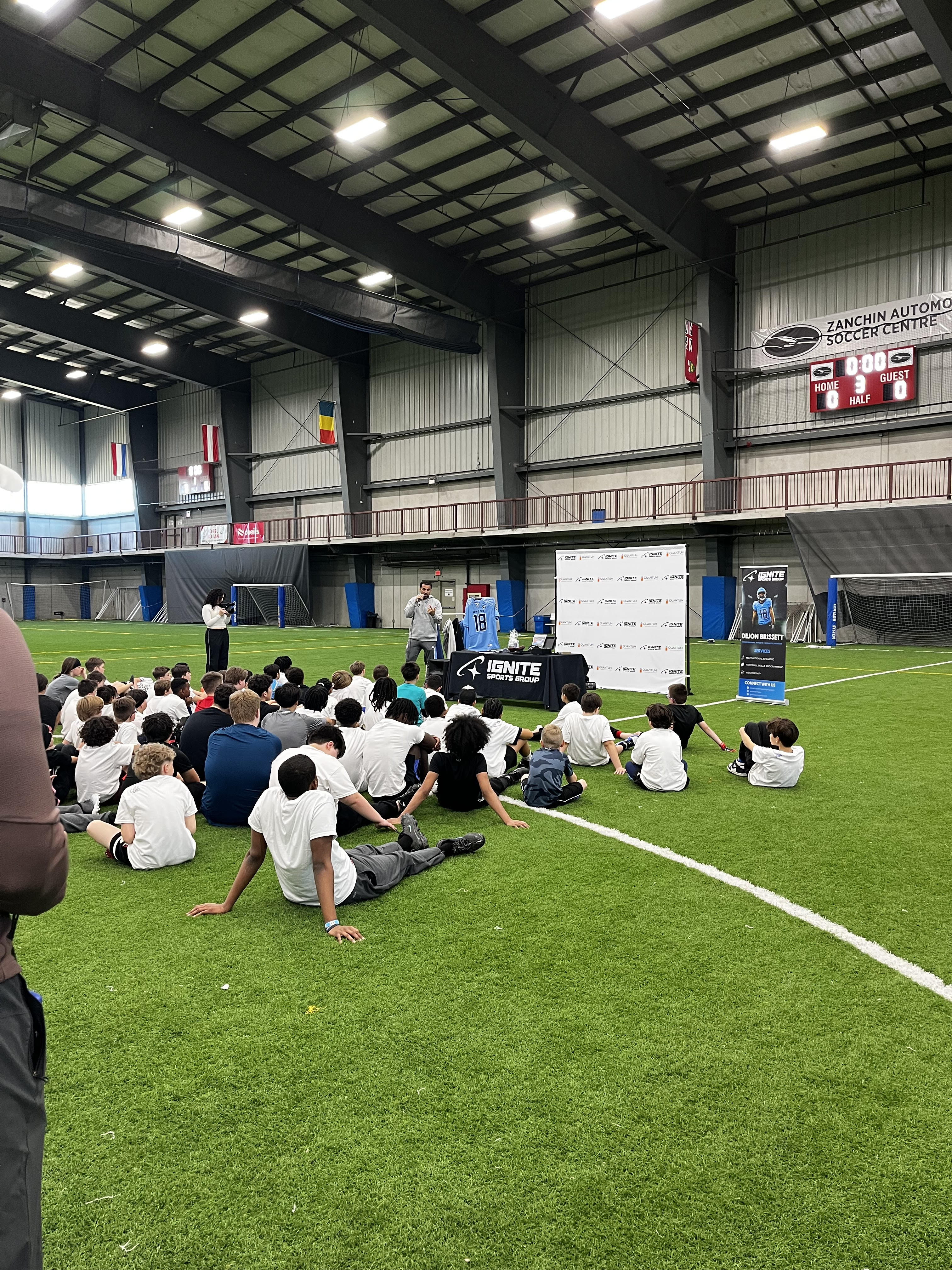 SCX sports clinic with professional athletes teaching young participants